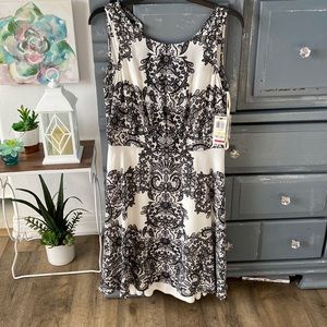 Breezy fun cream and white lace pattern INC dress. size 4